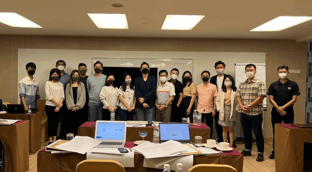 Group photo in a conference room.